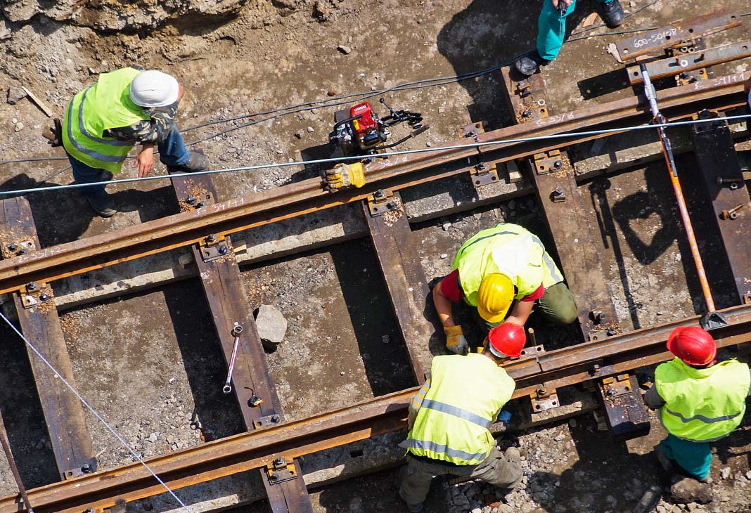 Workers working on rail project, view from above